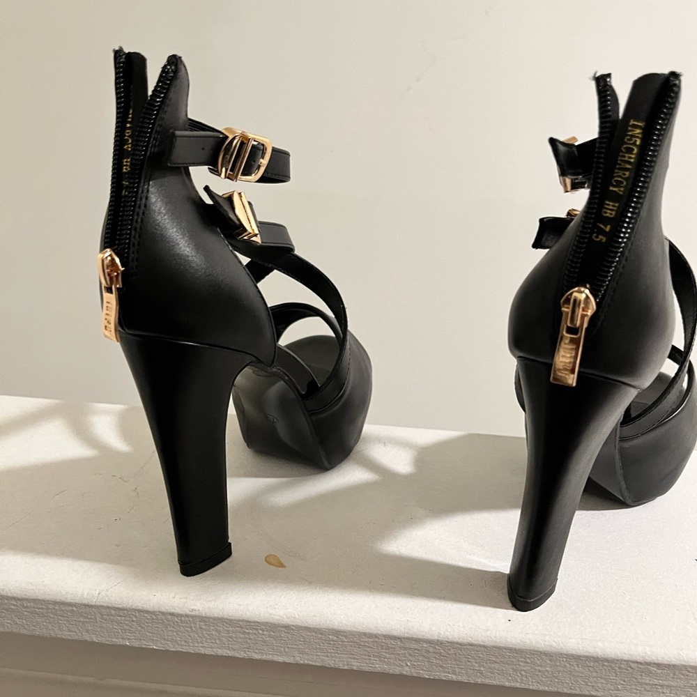 Black zip up heels